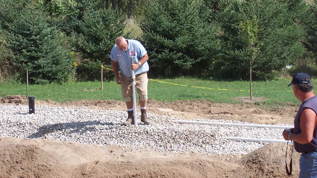 Keith Petersen Plumbing installing new construction sewer and septic rough in